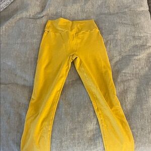 Yellow women’s Bombshell Sportswear scrunch butt leggings